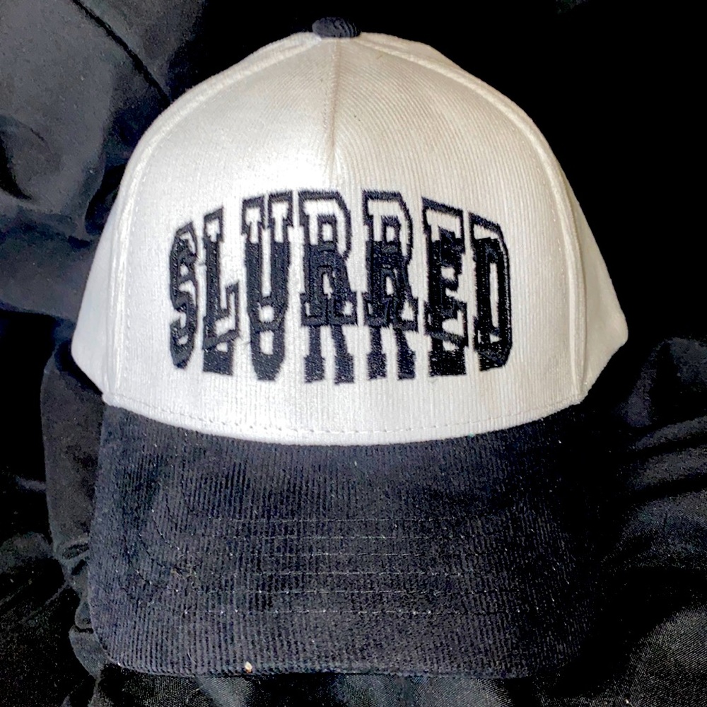 Slurred trucker hat